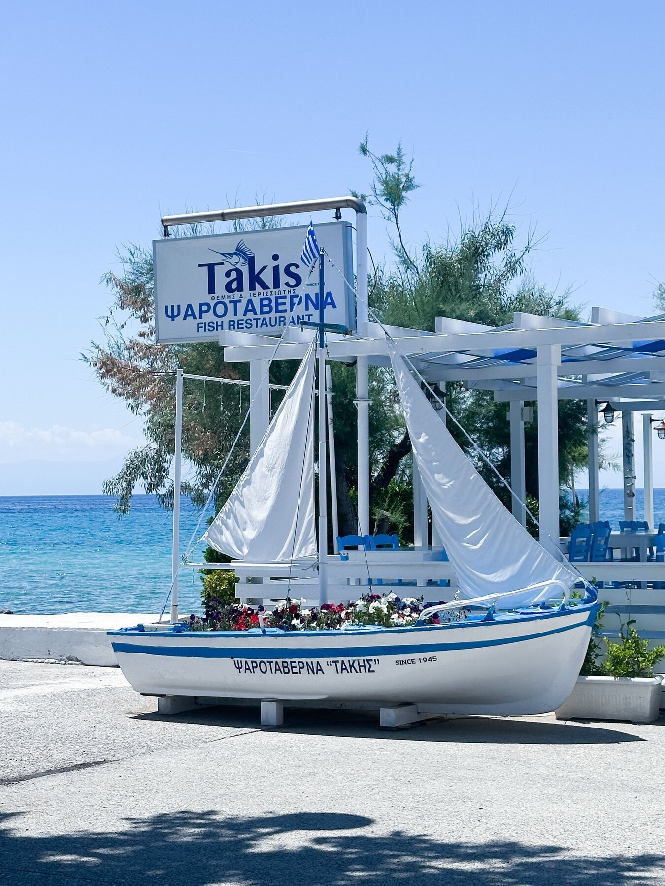 Traditional Greek fish taverna beside the sea